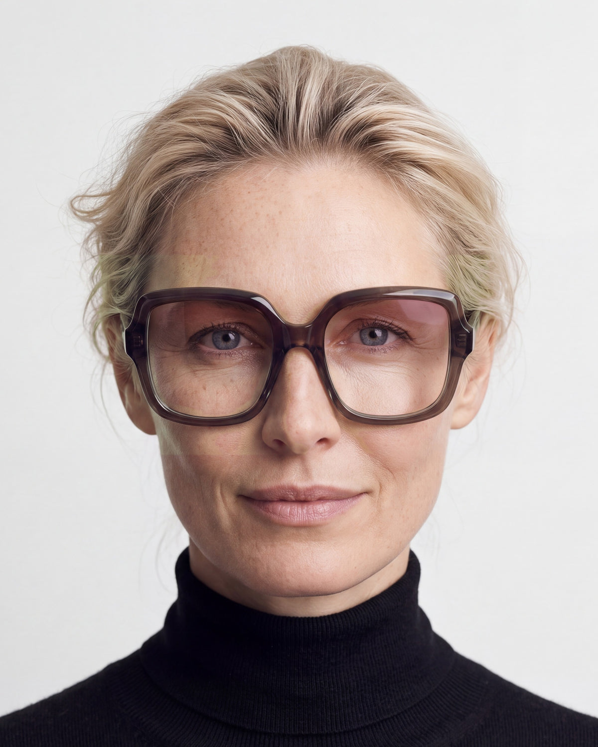 Elara in dark brown, worn, Heather lenses
